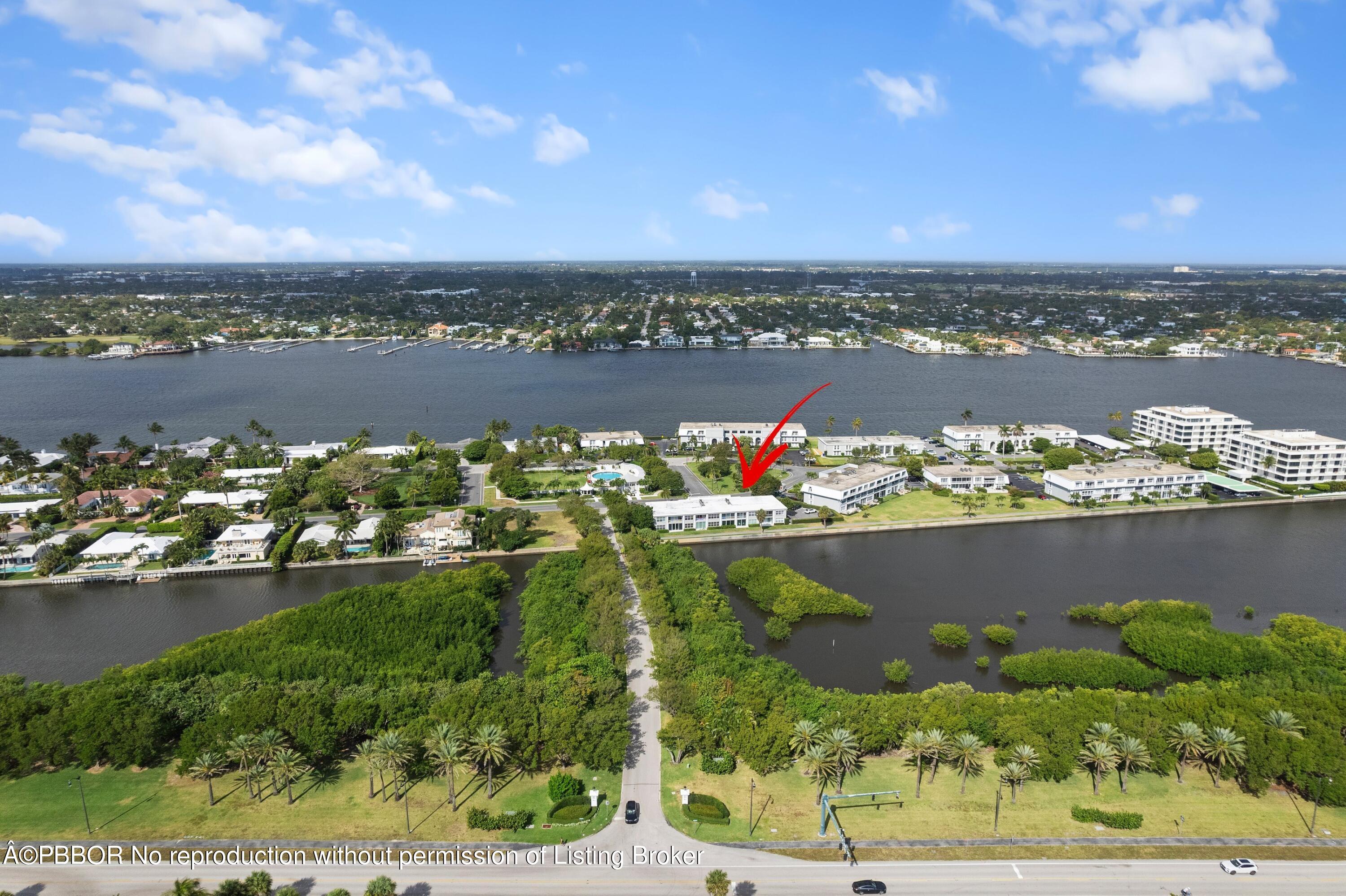 2195 Ibis Isle Road, Unit 1 Palm Beach, FL 33480 - Photo 26 of 38 an aerial view of a house with a lake view