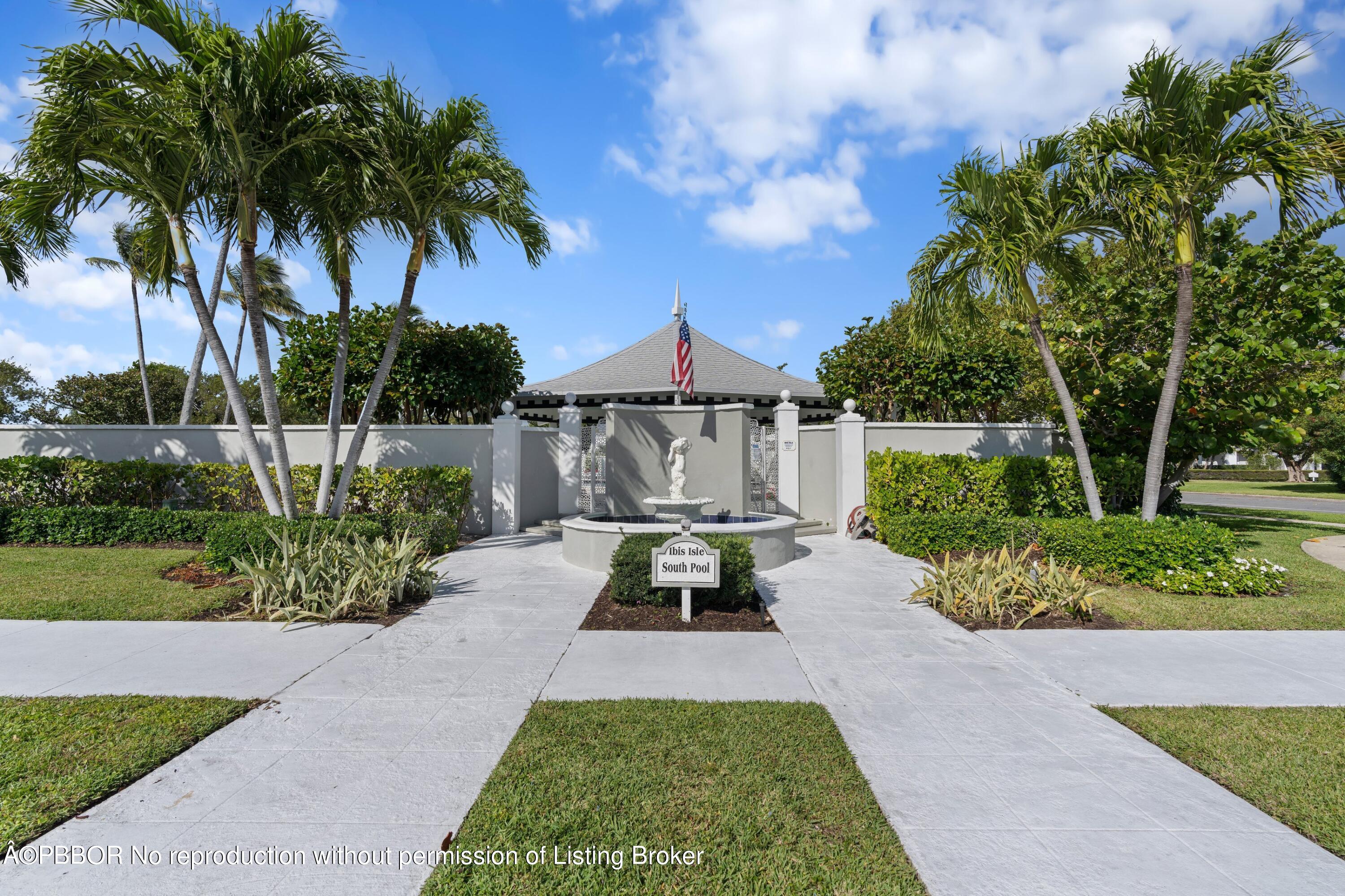 2195 Ibis Isle Road, Unit 1 Palm Beach, FL 33480 - Photo 29 of 38 a front view of a house with garden
