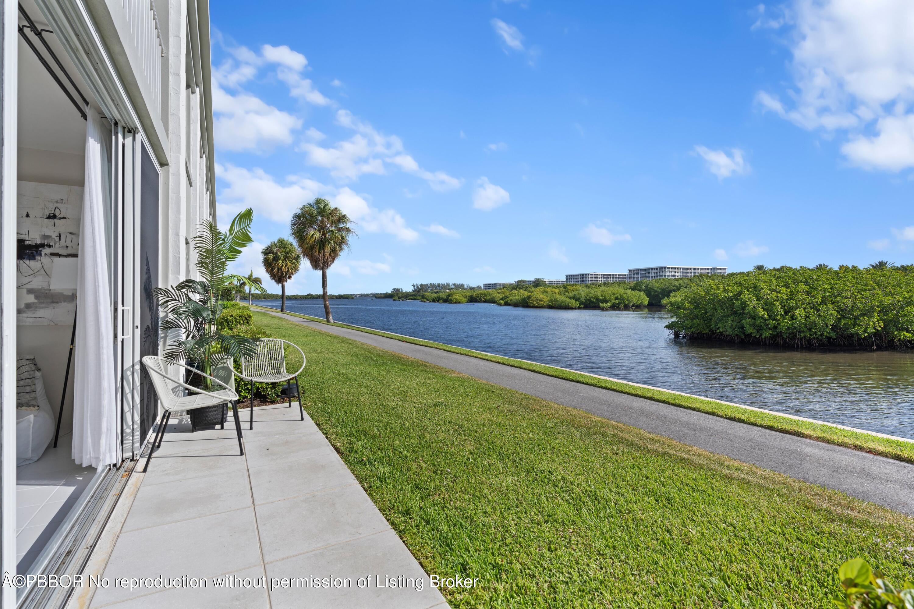 2195 Ibis Isle Road, Unit 1 Palm Beach, FL 33480 - Photo 5 of 38 a view of a balcony with lake view and mountain view