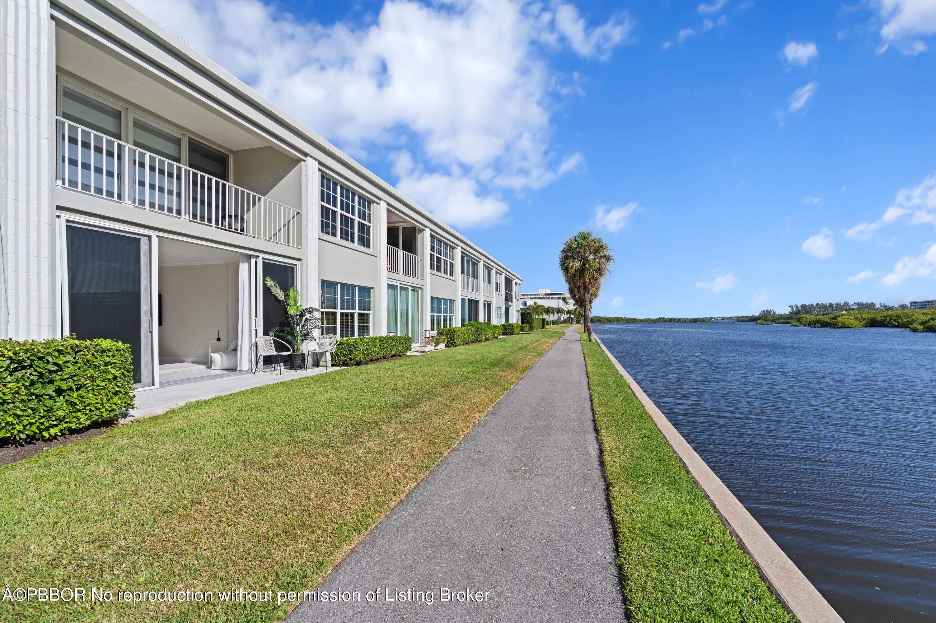 2195 Ibis Isle Road, Unit 1 Palm Beach, FL 33480 - Photo 6 of 38 a view of an house with backyard and garden