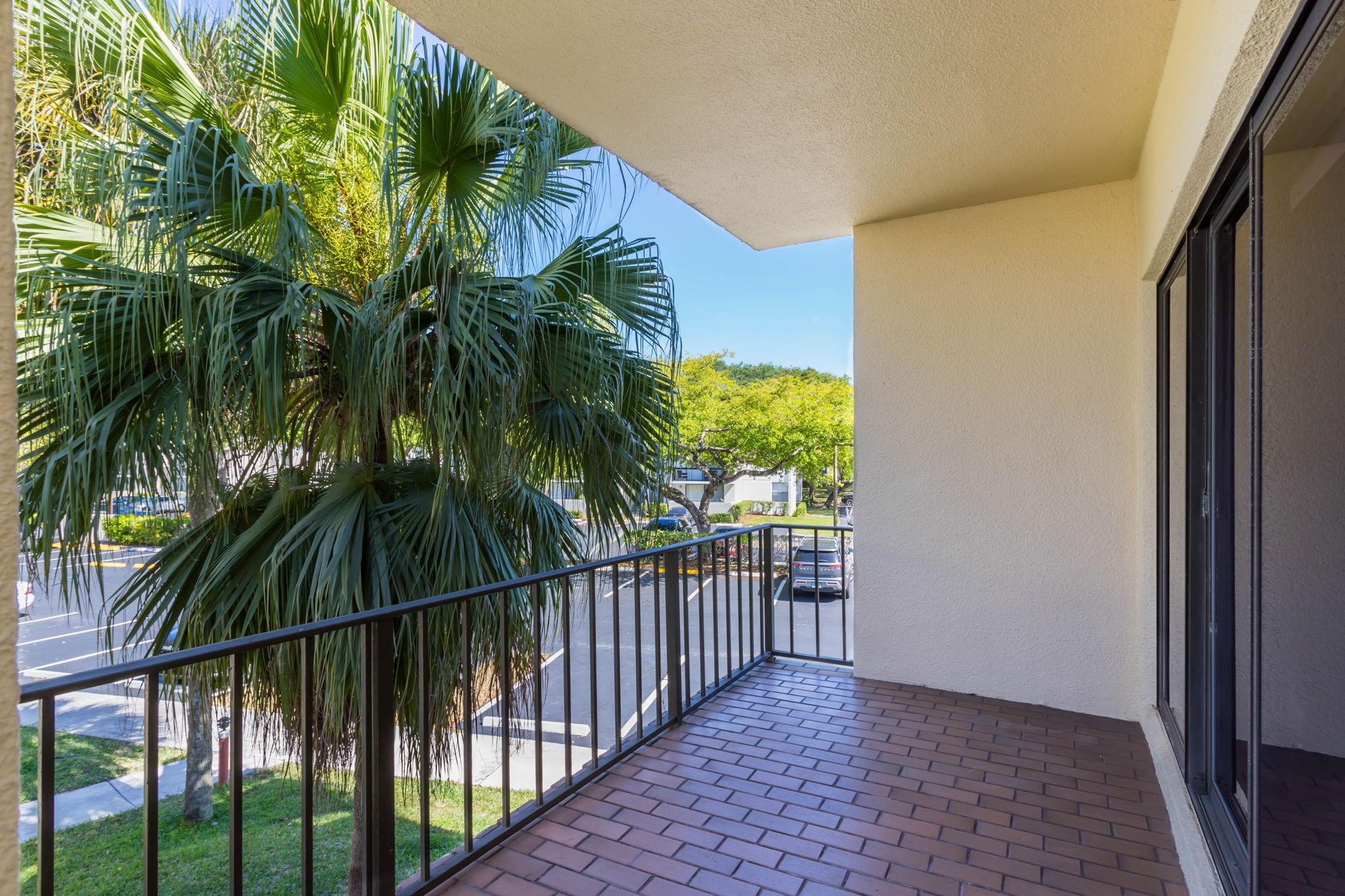 301 North Pine Island Road, Unit 217 Plantation, FL 33324 - Photo 18 of 25 Living room balcony