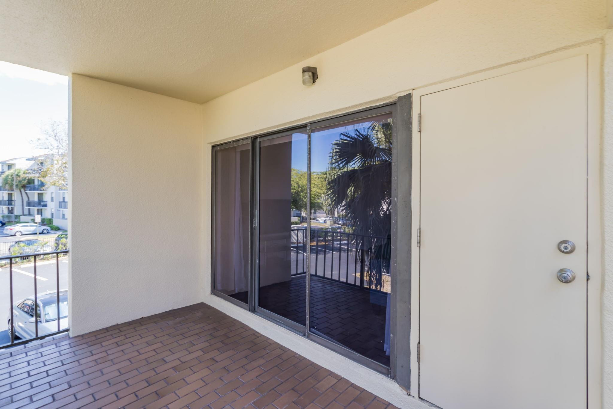 301 North Pine Island Road, Unit 217 Plantation, FL 33324 - Photo 19 of 25 Living Room Balcony