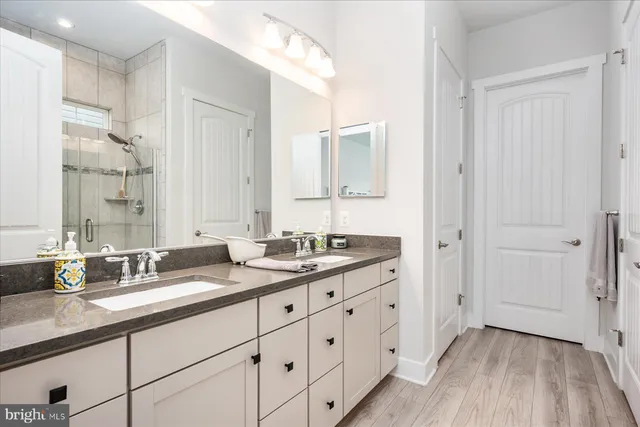 a bedroom with a bed and chair