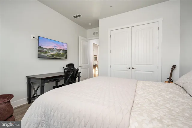 an aerial view of a city with lots of residential buildings