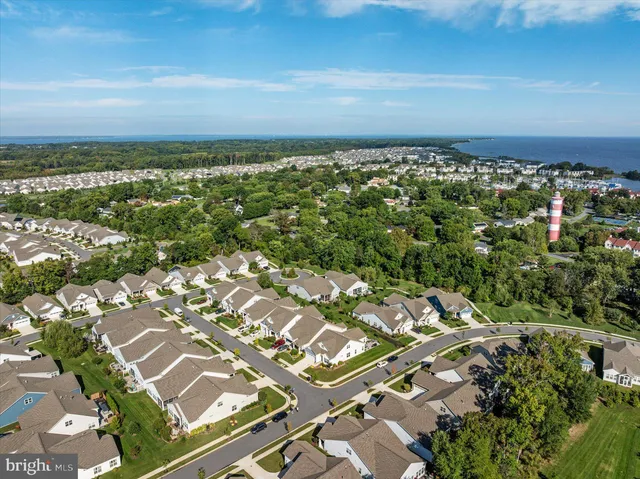 a view of a swimming pool with a table and chairs