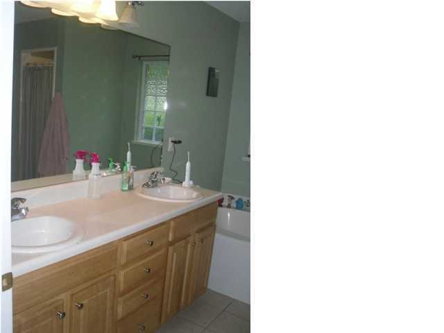 4821 Acorn Drive Crestview, FL 32539 - Photo 25 of 25 a bathroom with a sink and a mirror