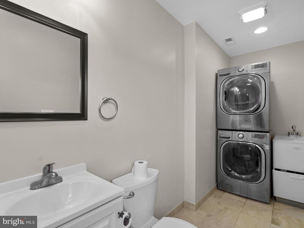 11603 Vale Road Oakton, VA 22124 - Photo 24 of 63 half bath is entrance to pool area with laundry