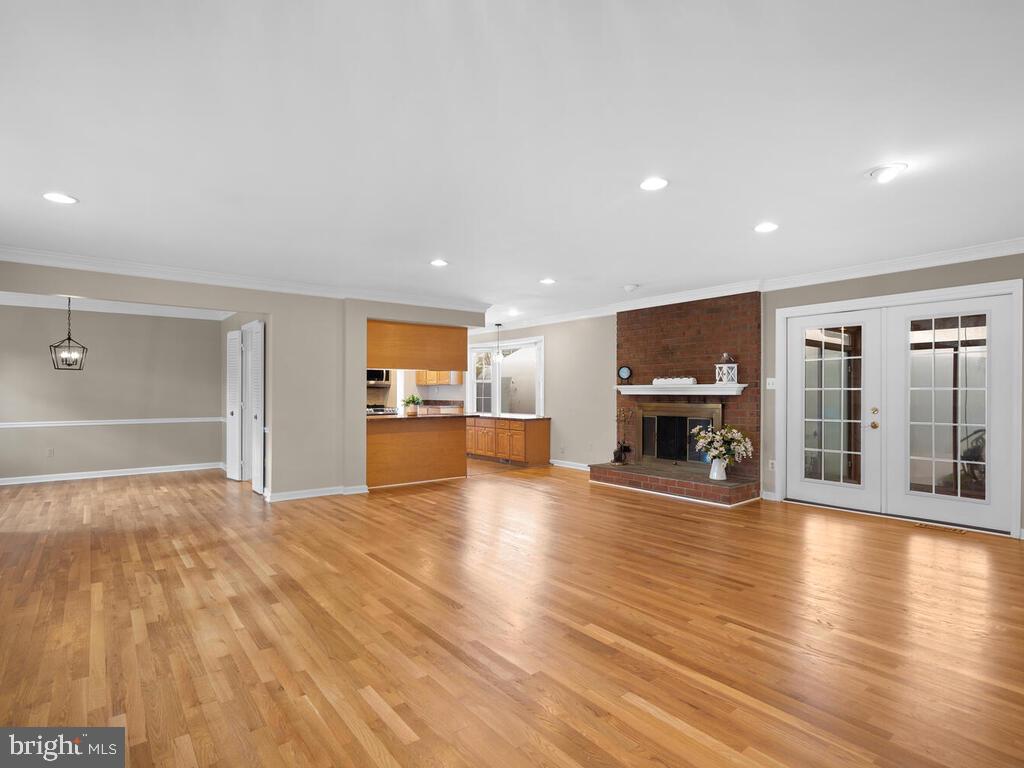 11603 Vale Road Oakton, VA 22124 - Photo 63 of 63 open floor plan with wood burning fireplace