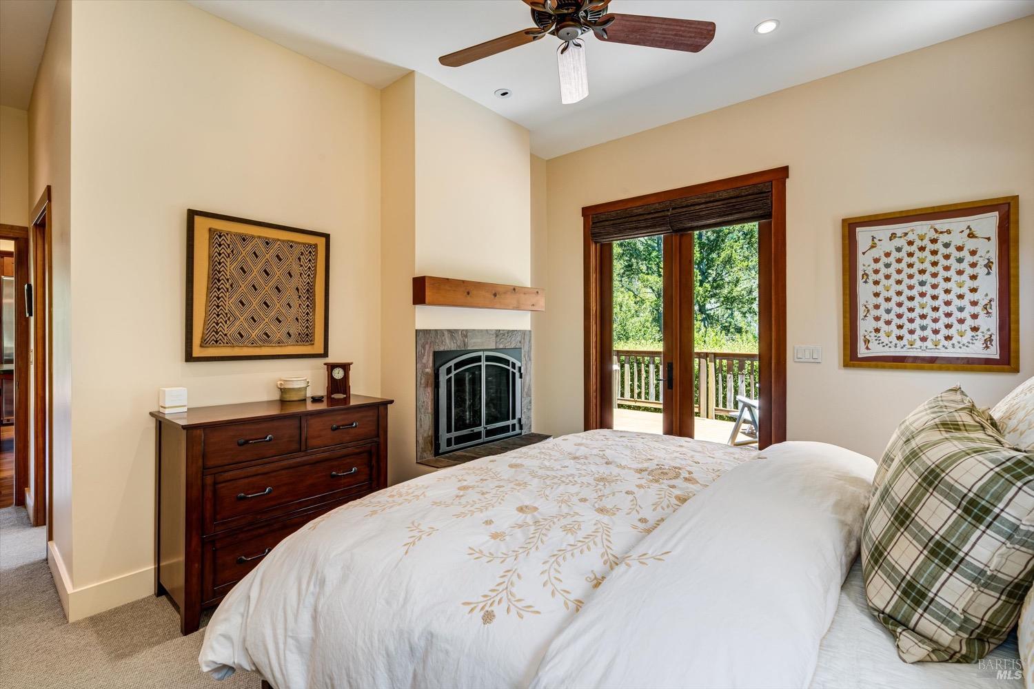 2207 Mt Veeder Road Napa, CA 94558 - Photo 15 of 36 a bedroom with a bed and a flat screen tv