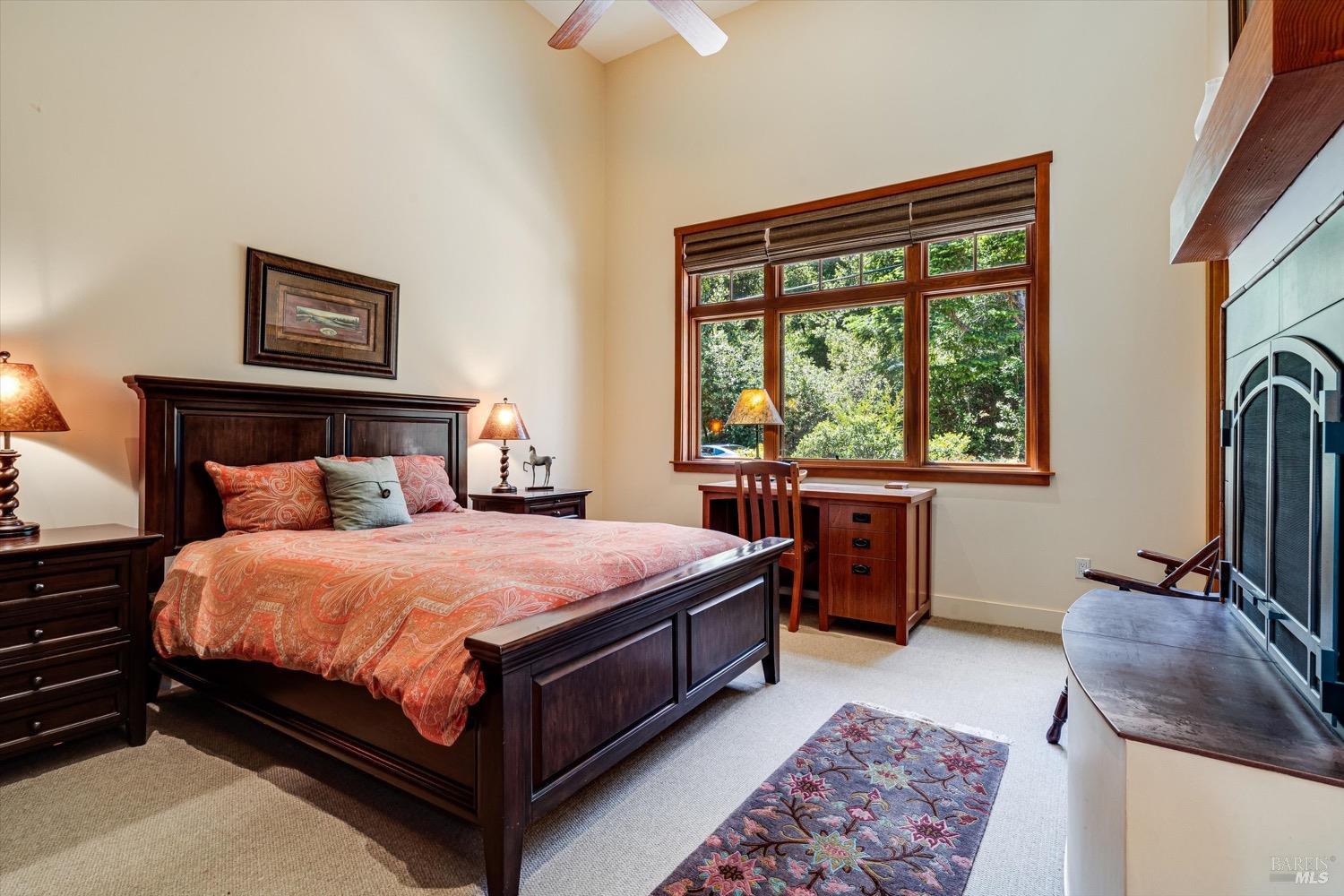 2207 Mt Veeder Road Napa, CA 94558 - Photo 18 of 36 a bedroom with a bed and a window with chair