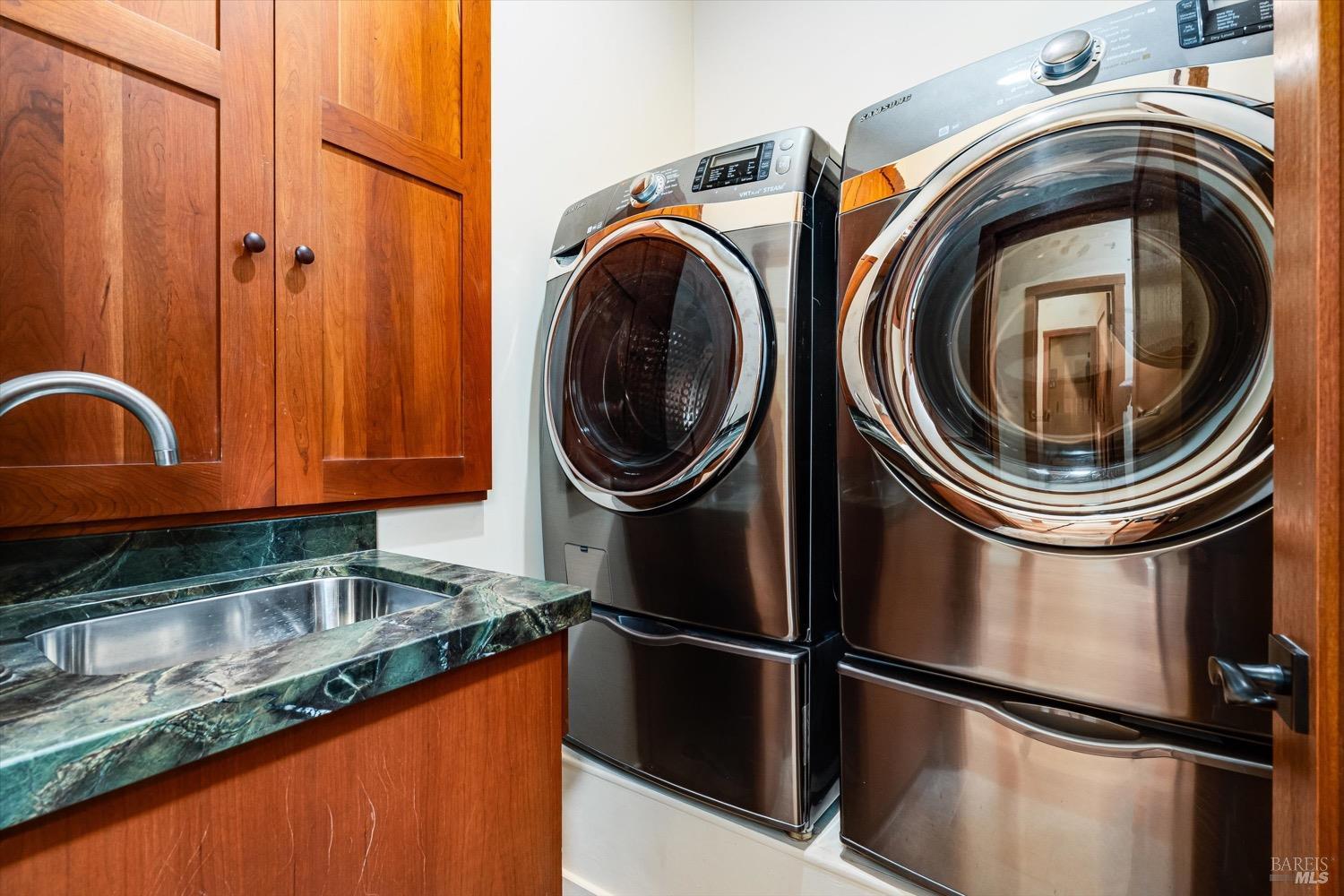 2207 Mt Veeder Road Napa, CA 94558 - Photo 24 of 36 a close up view of a sink and a washer dryer