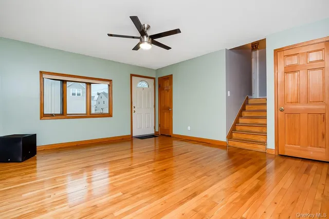 a view of wooden deck and city view