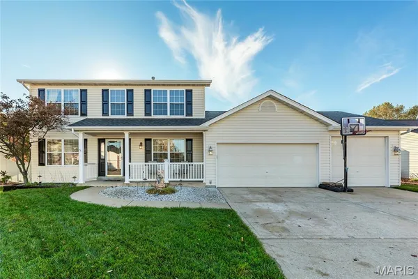 $430,000 | 742 Oak Leaf Bluff Drive, St. Charles, MO 63304
