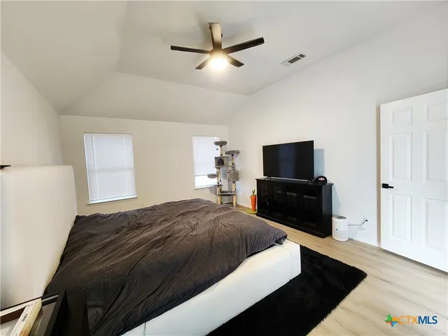 a bathroom with a bathtub and a sink