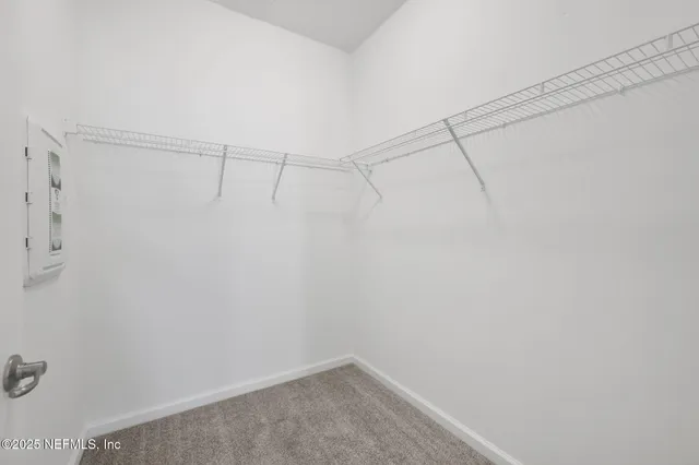 a view of a room with racks on the wall