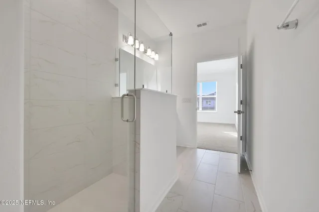 a view of a chandelier in an empty room