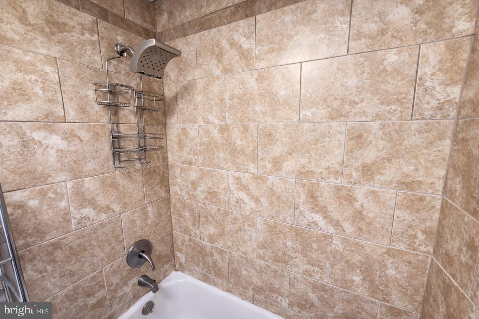 3325 McShane Way Baltimore, MD 21222 - Photo 19 of 23 a bathroom with a shower