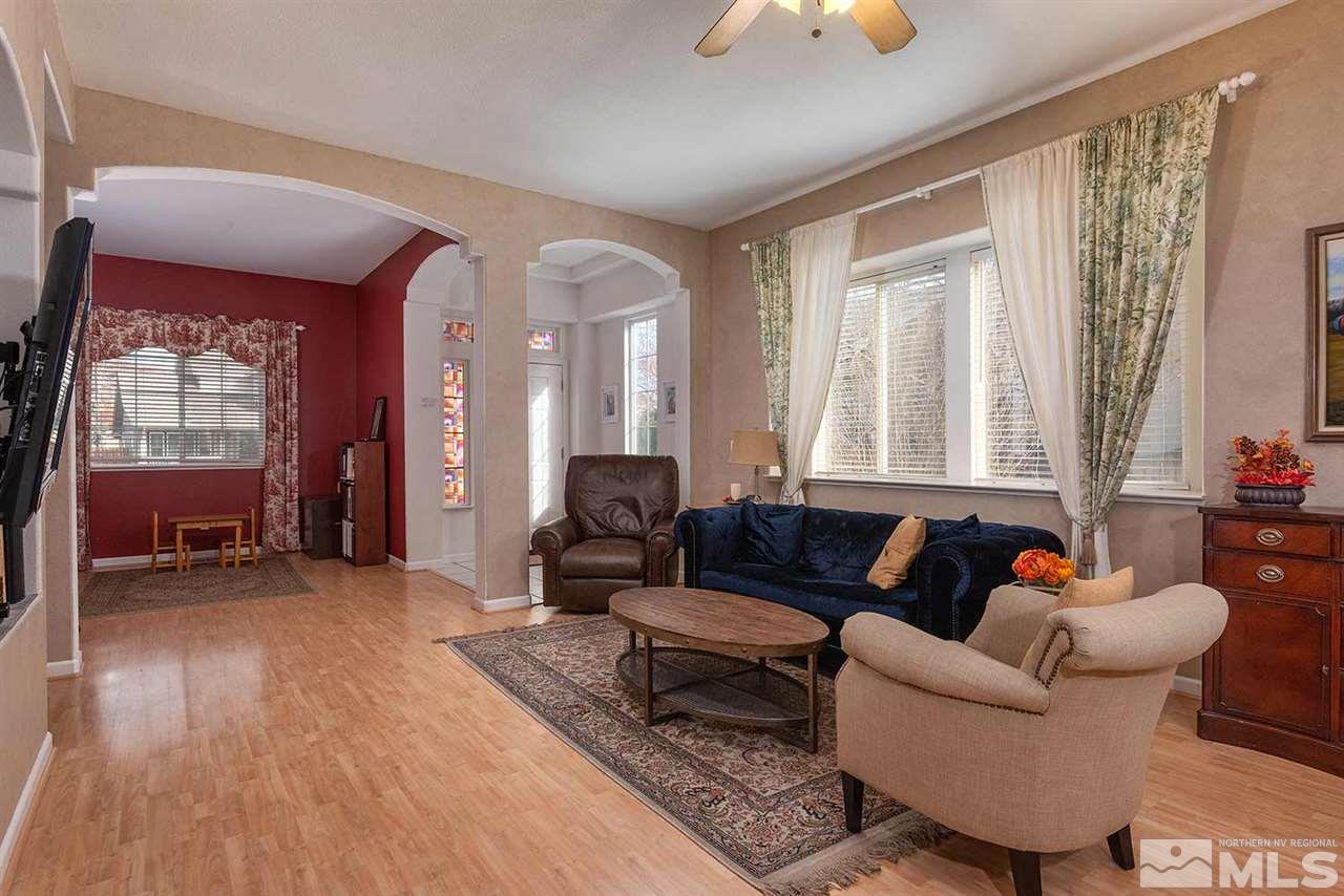 5540 Daybreak Drive Reno, NV 89523 - Photo 6 of 23 a living room with furniture and a window
