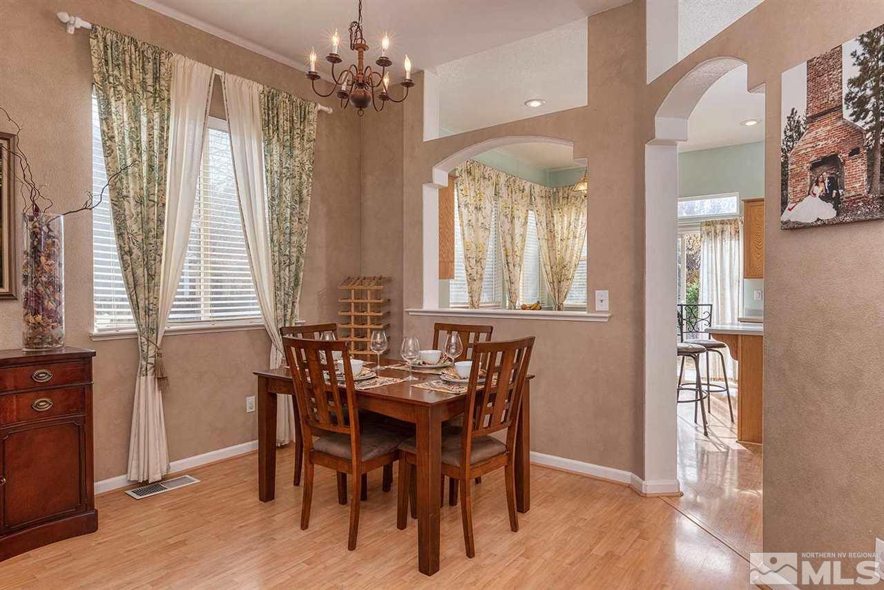5540 Daybreak Drive Reno, NV 89523 - Photo 7 of 23 a view of a dining room with furniture and window