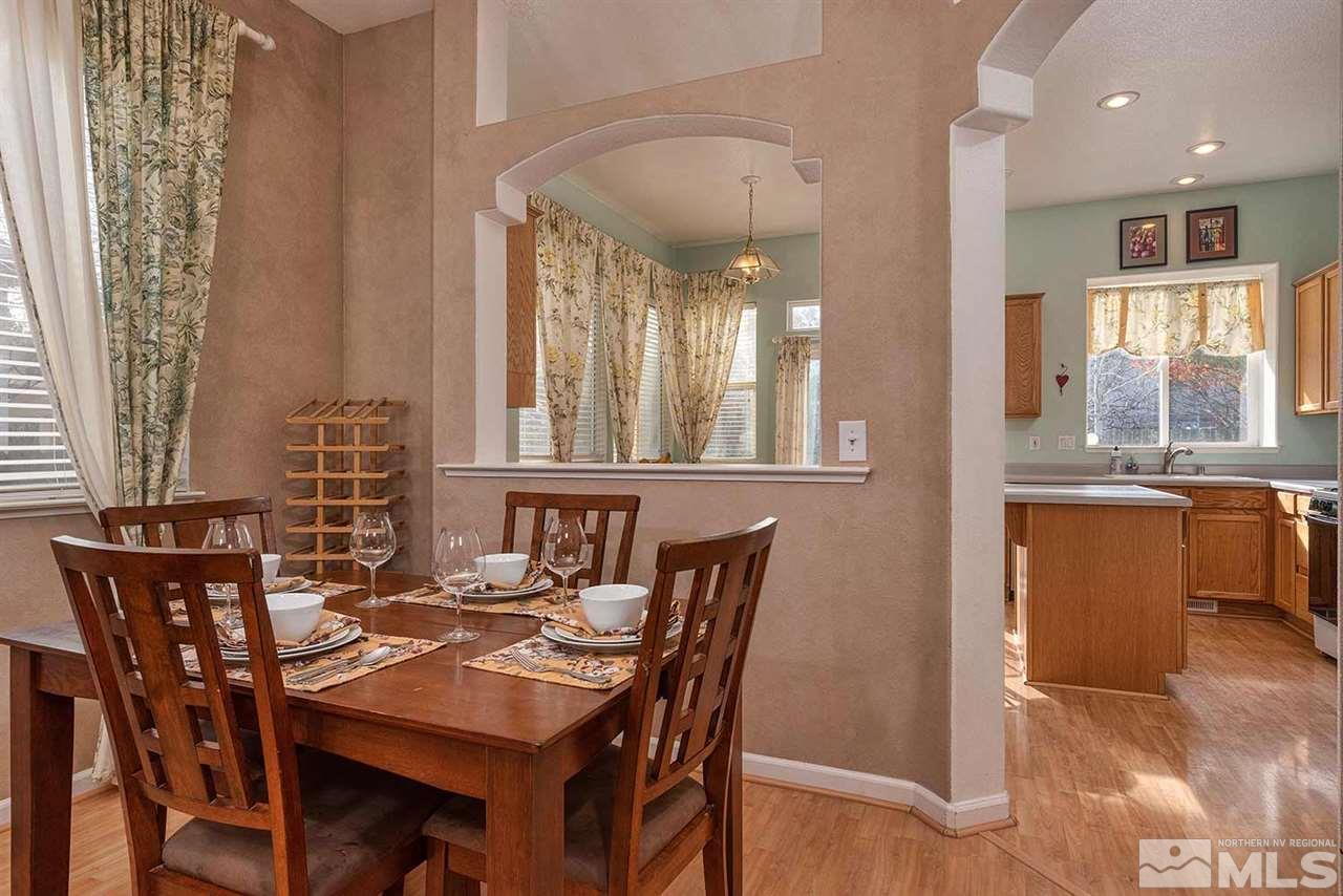 5540 Daybreak Drive Reno, NV 89523 - Photo 8 of 23 a view of a dining room with furniture and window