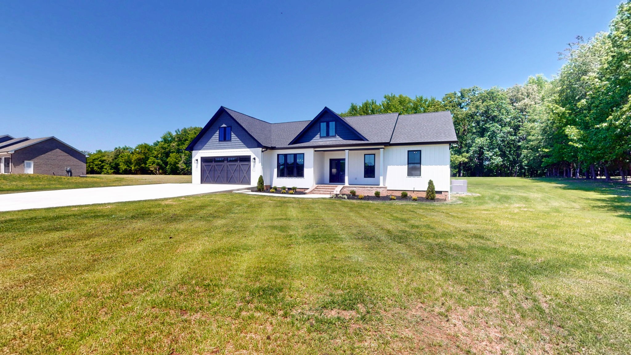 865 Alman Cemetery Road Paris, TN 38242 - Photo 31 of 41 a view of a house with a swimming pool
