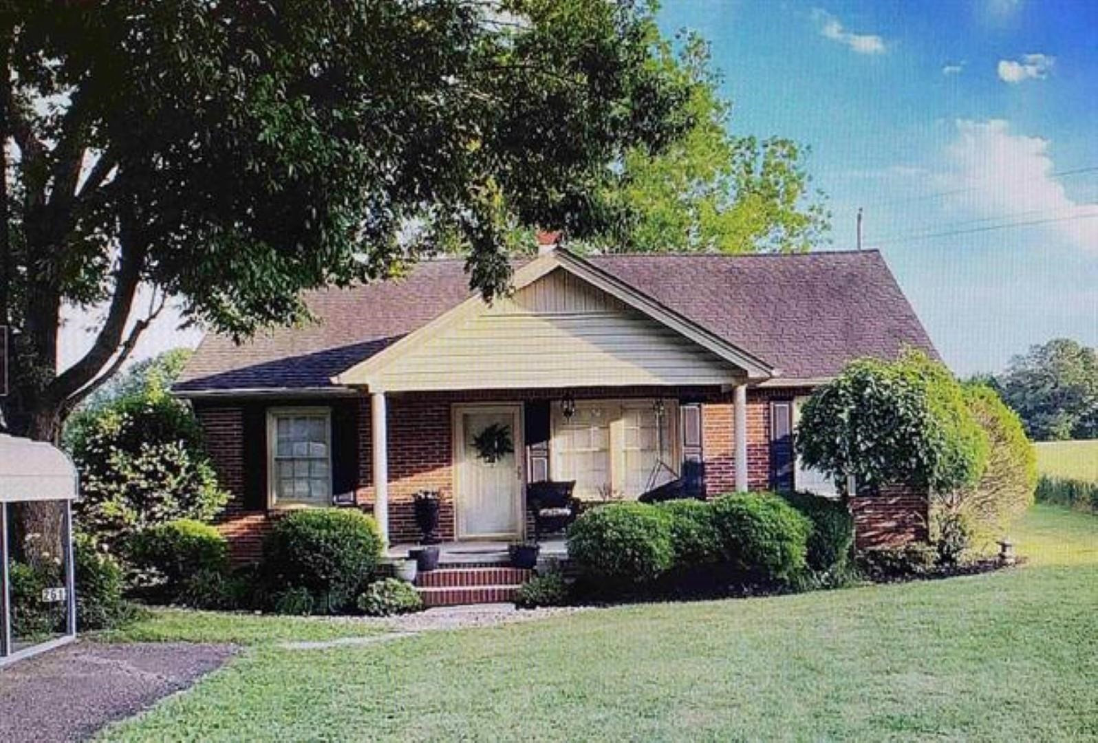 2612 Old Jackson Road Bells, TN 38006 - Photo 1 of 1 a front view of house with yard and green space