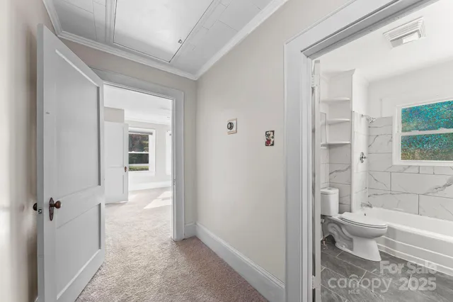 a bathroom with a sink a toilet and bathtub