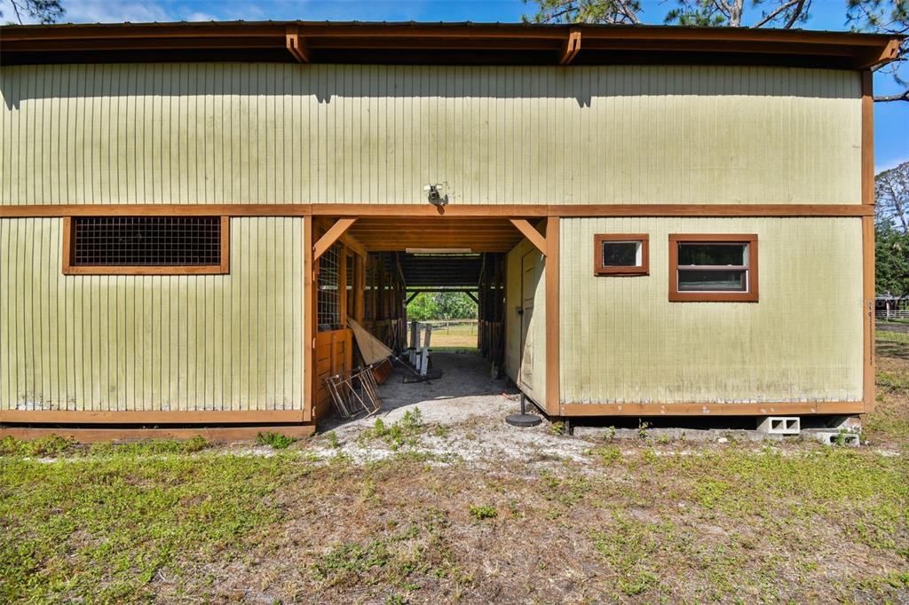 2853 Saffold Road Wimauma, FL 33598 - Photo 8 of 62 a view of a house with a garage