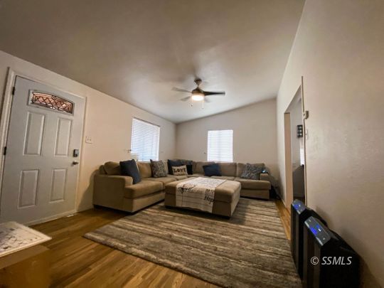 333 North Helena Street Ridgecrest, CA 93555 - Photo 12 of 35 a living room with furniture and a wooden floor