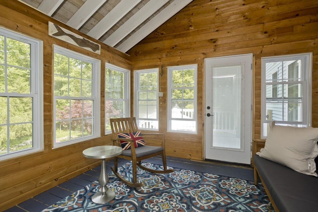 581 Burts Pit Road Northampton, MA 01062 - Photo 17 of 35 a living room with furniture and a window