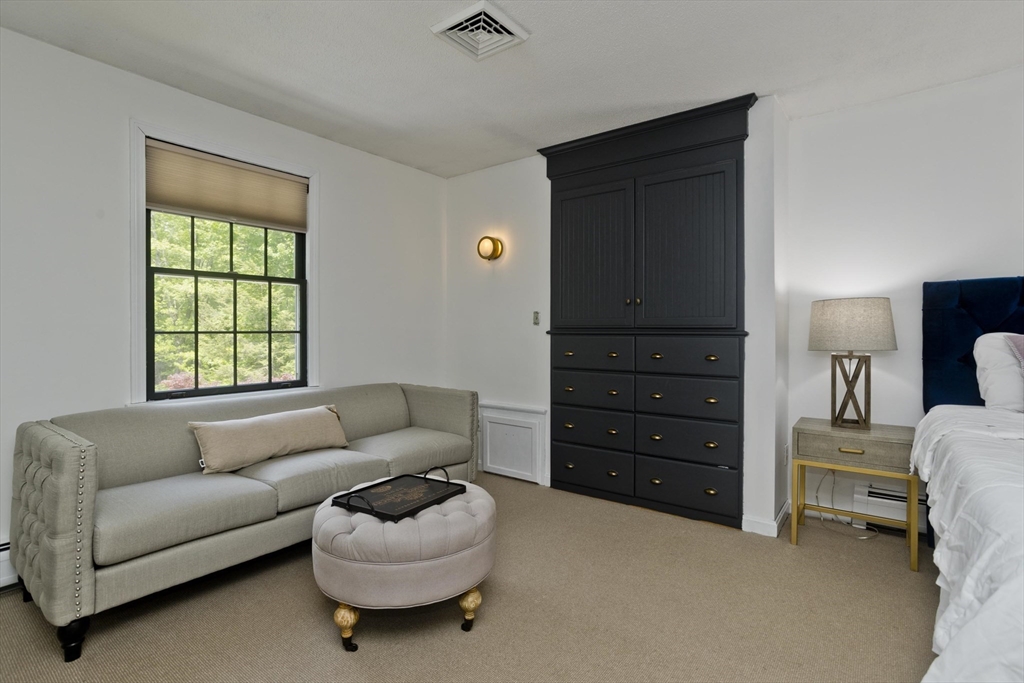 581 Burts Pit Road Northampton, MA 01062 - Photo 21 of 35 a living room with furniture and a window