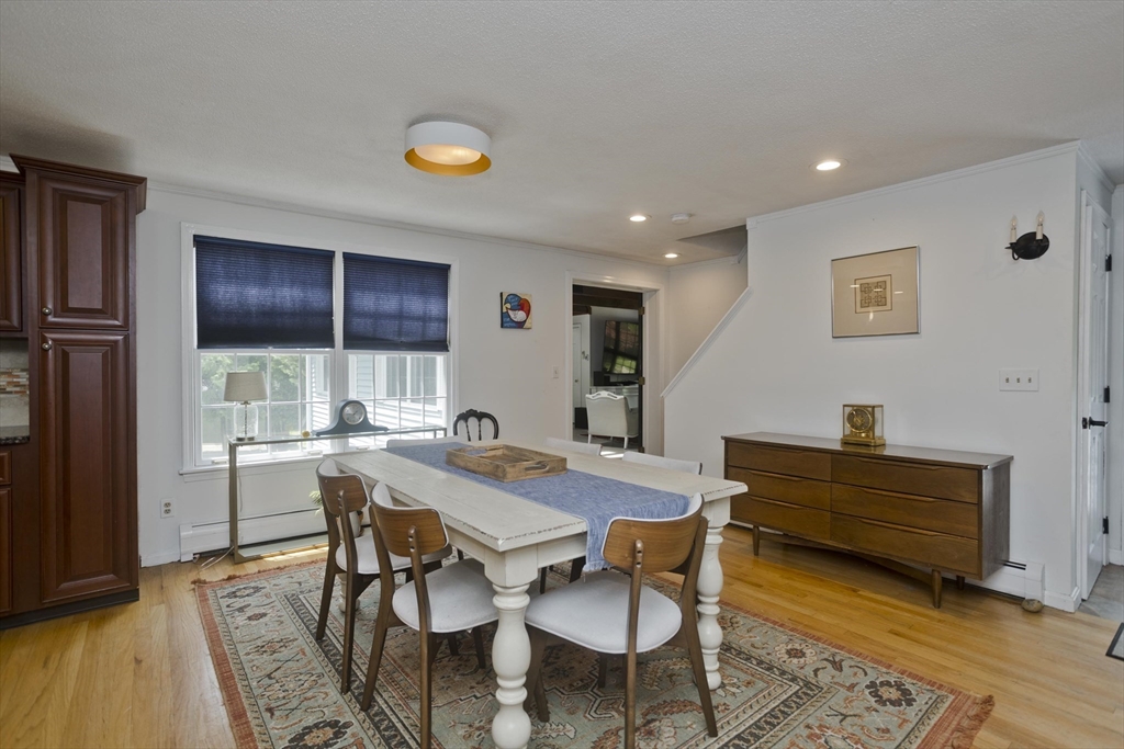 581 Burts Pit Road Northampton, MA 01062 - Photo 8 of 35 a view of a dining room with furniture and wooden floor