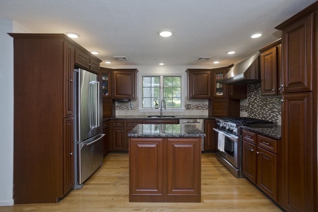581 Burts Pit Road Northampton, MA 01062 - Photo 10 of 35 a kitchen with stainless steel appliances granite countertop a stove a refrigerator and a sink