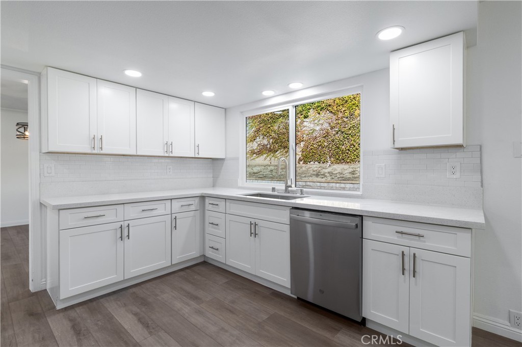 10672 Finch Avenue Rancho Cucamonga, CA 91737 - Photo 14 of 39 a kitchen with sink cabinets and window