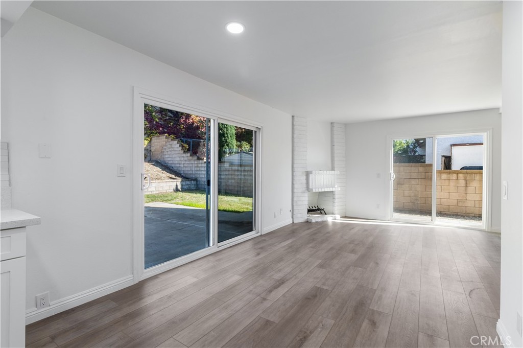 10672 Finch Avenue Rancho Cucamonga, CA 91737 - Photo 17 of 39 wooden floor in an empty room with a window