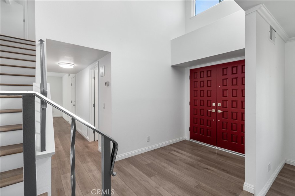10672 Finch Avenue Rancho Cucamonga, CA 91737 - Photo 5 of 39 a view of an entryway with staircase