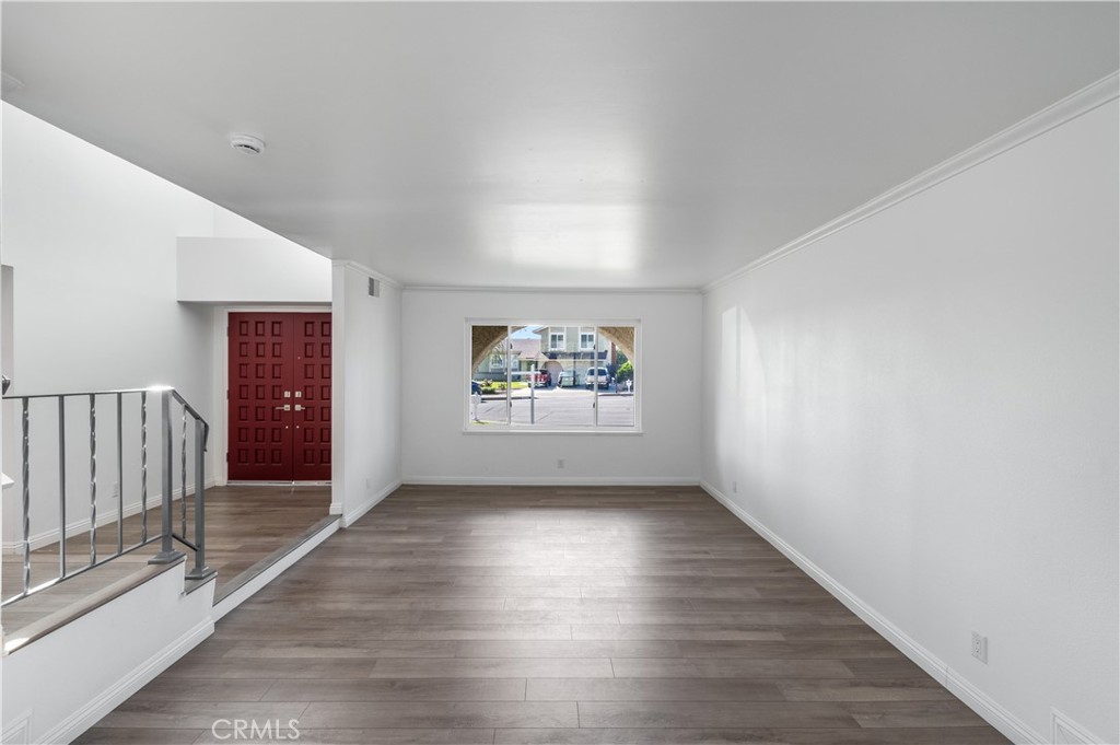 10672 Finch Avenue Rancho Cucamonga, CA 91737 - Photo 10 of 39 wooden floor in an empty room with a window