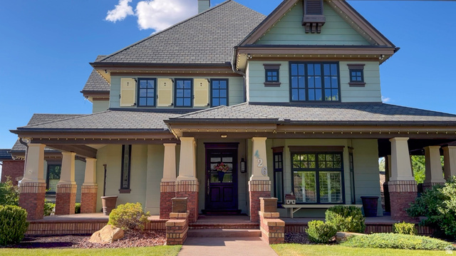 426 West Center Street Parowan, UT 84761 - Photo 3 of 107 Distinctive exterior featuring a covered porch with substantial columns, brick accents, and a multi-gabled roofline