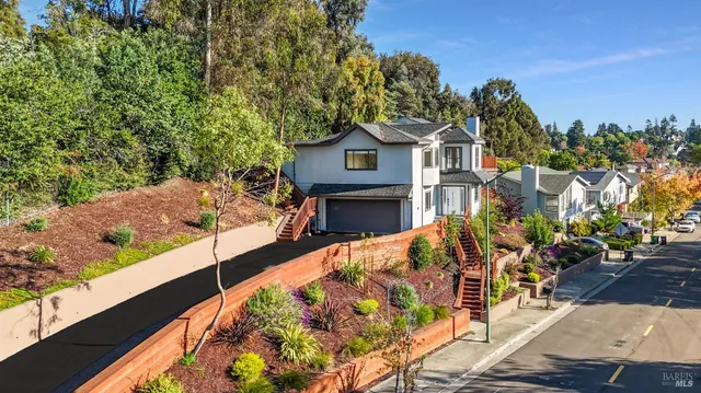 a view of house with yard