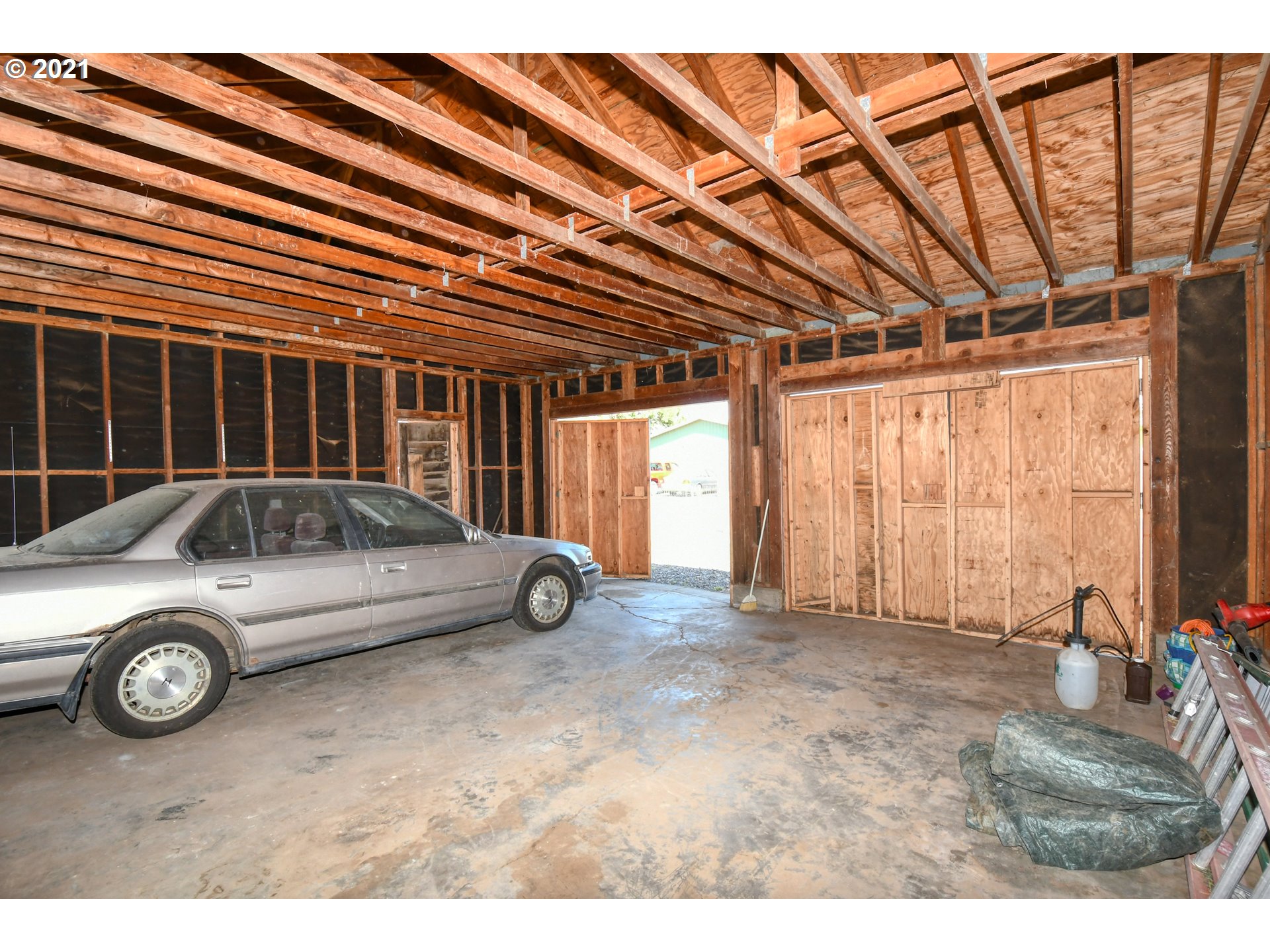 315 Vesper Street Helix, OR 97835 - Photo 30 of 32 a view of a car parked in front of a house