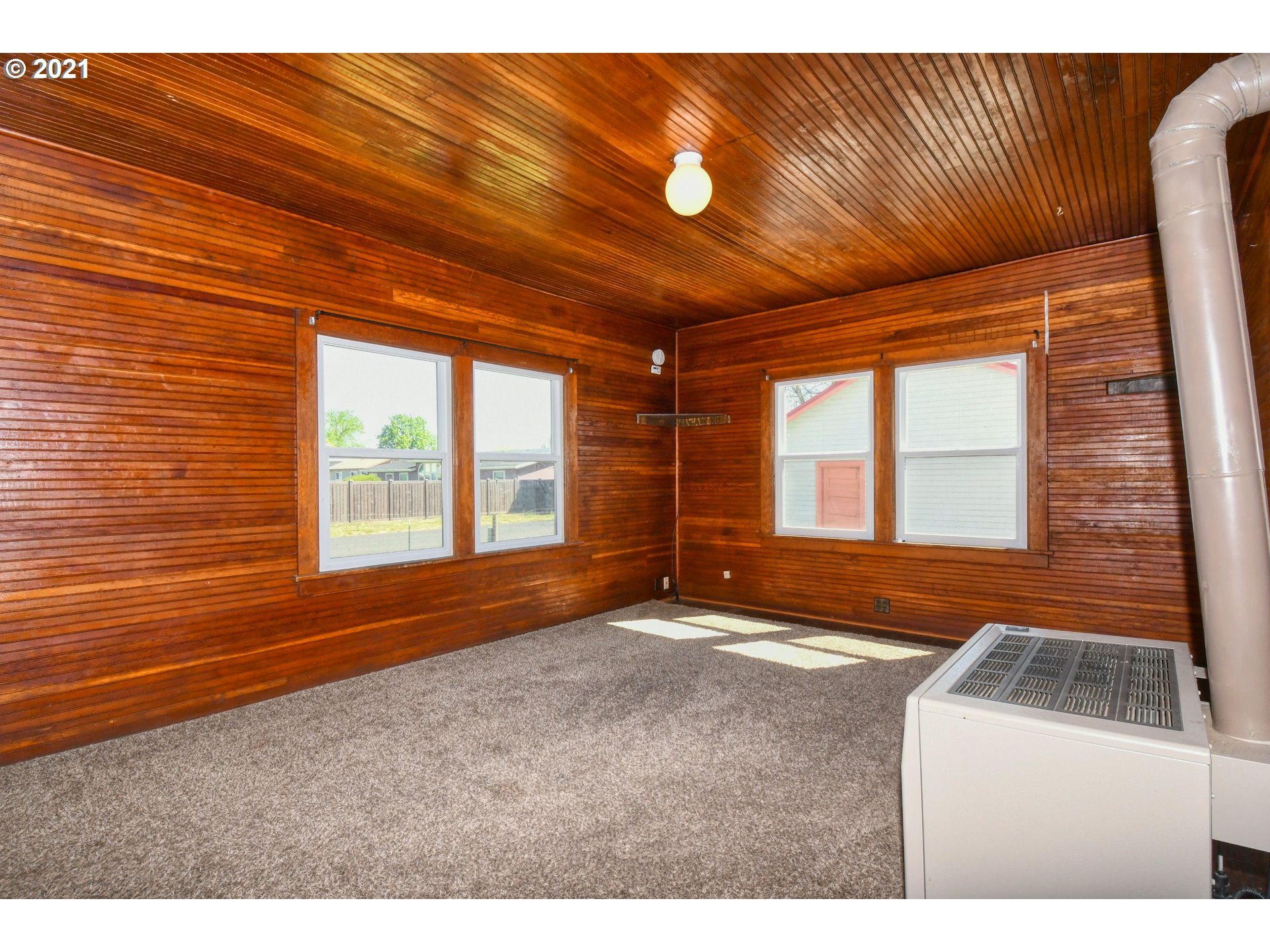 315 Vesper Street Helix, OR 97835 - Photo 10 of 32 a view of an empty room with a window