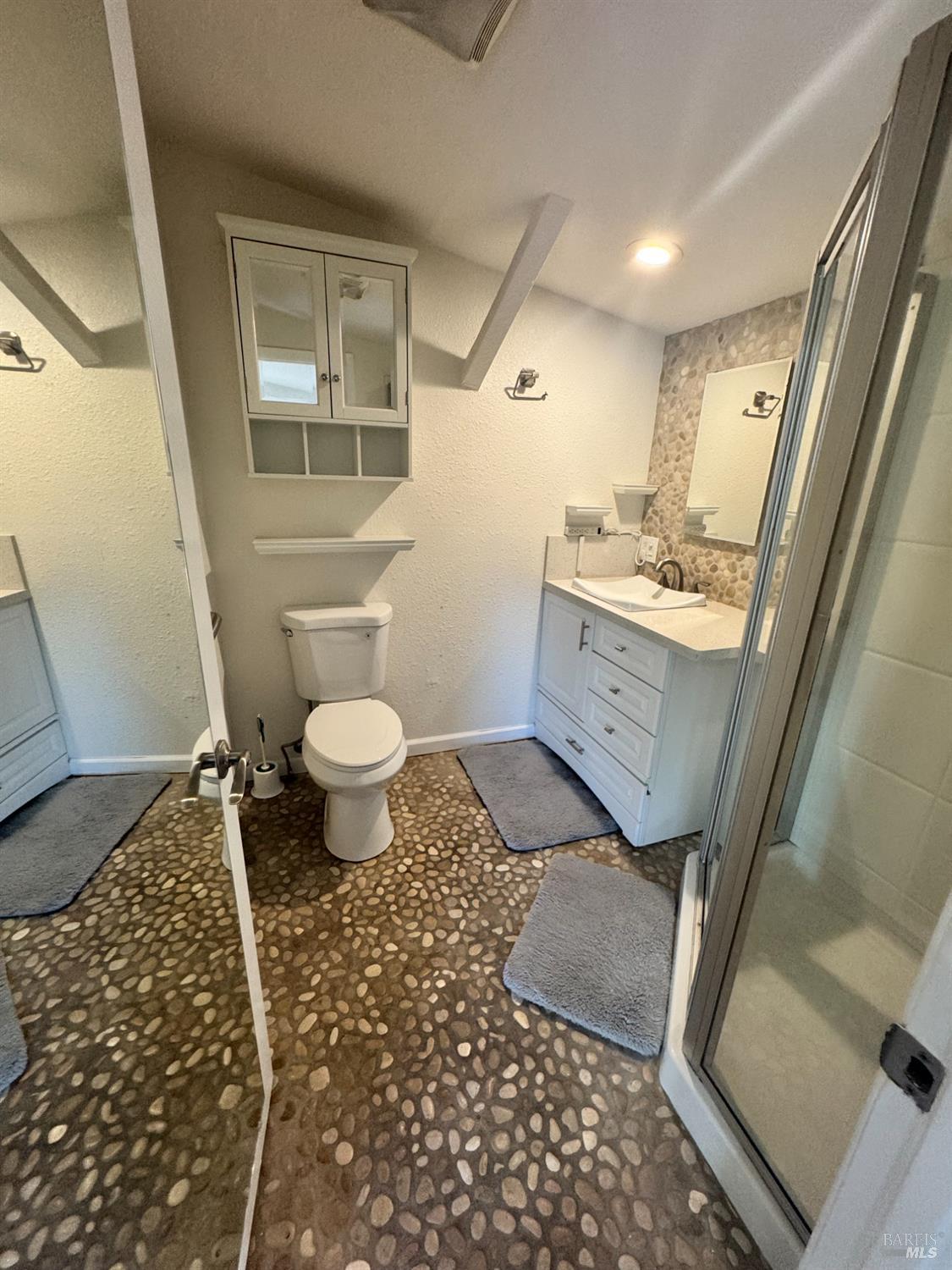 3753 Santa Rosa Avenue, Unit E Santa Rosa, CA 95407 - Photo 10 of 16 a bathroom with a sink toilet and shower
