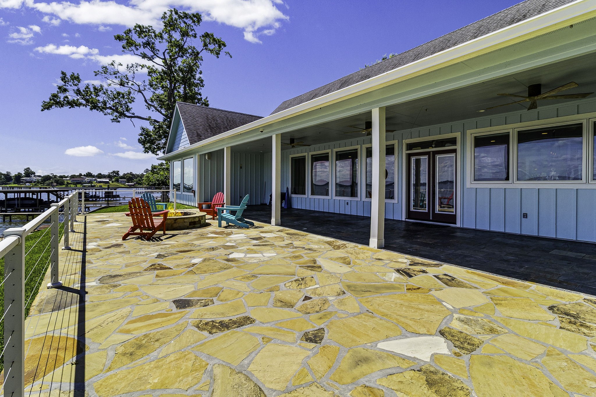 151 Key Largo Loop Point Blank, TX 77364 - Photo 31 of 49 Covered waterfront patio offers the perfect setting for relaxing, entertaining, and enjoying stunning sunsets.