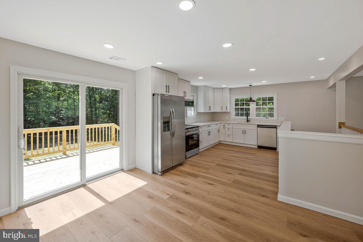 13304 Cherry Tree Crossing Road Brandywine, MD 20613 - Photo 9 of 32 Bright and airy modern kitchen space.
