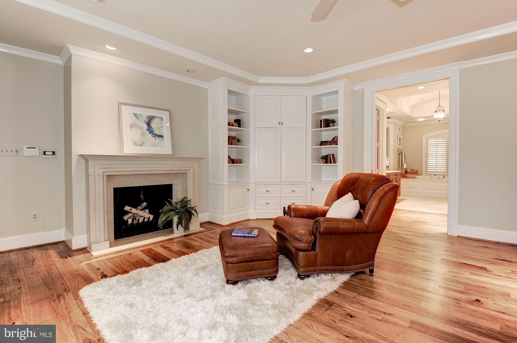 11400 Glen Road Potomac, MD 20854 - Photo 13 of 30 a living room with furniture and a fireplace