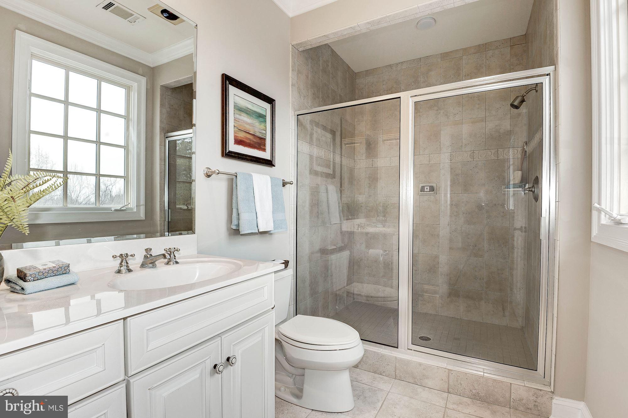 11400 Glen Road Potomac, MD 20854 - Photo 16 of 30 a bathroom with a sink toilet and shower