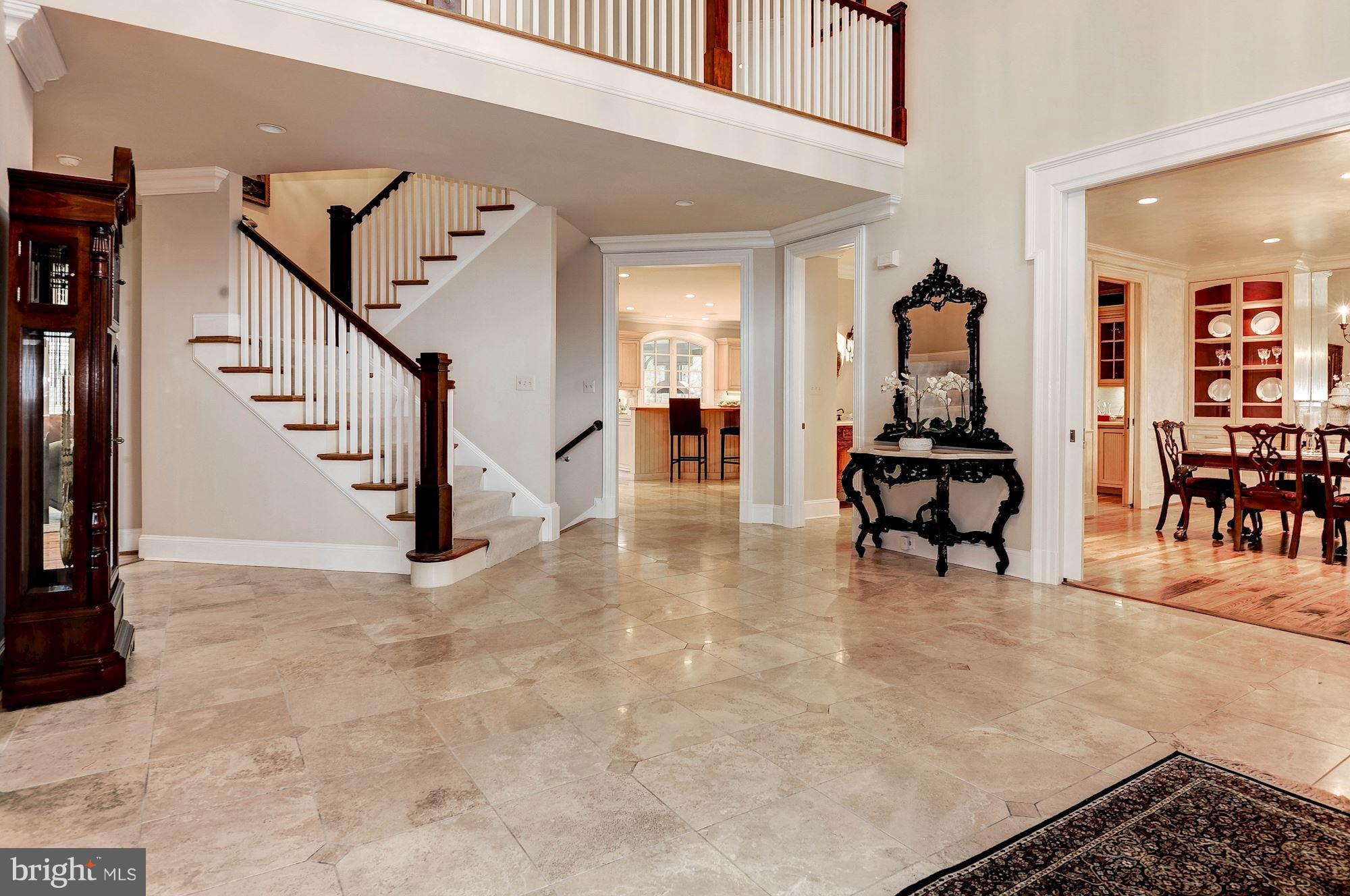 11400 Glen Road Potomac, MD 20854 - Photo 3 of 30 a view of livingroom with furniture and staircase