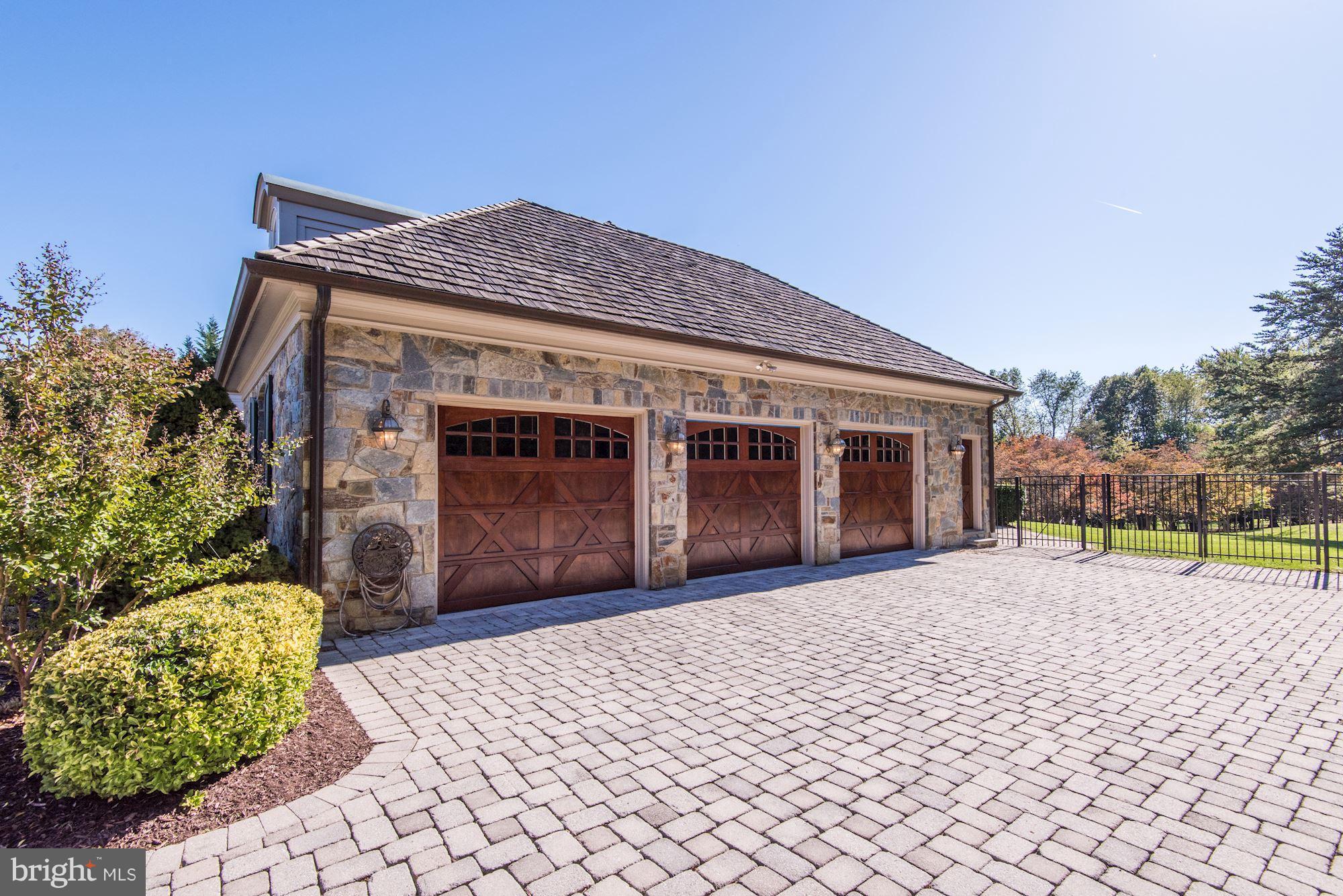 11400 Glen Road Potomac, MD 20854 - Photo 25 of 30 a front view of a house with a yard