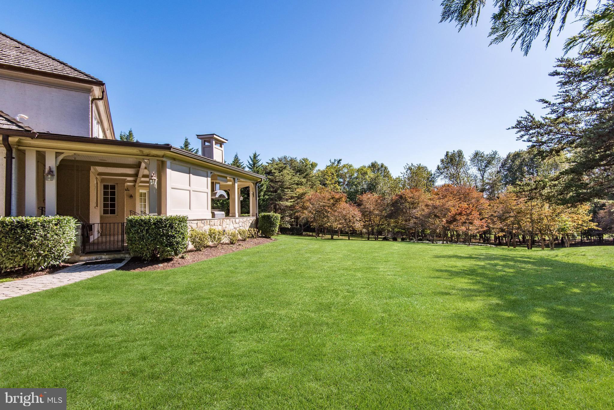 11400 Glen Road Potomac, MD 20854 - Photo 27 of 30 a front view of a house with a yard