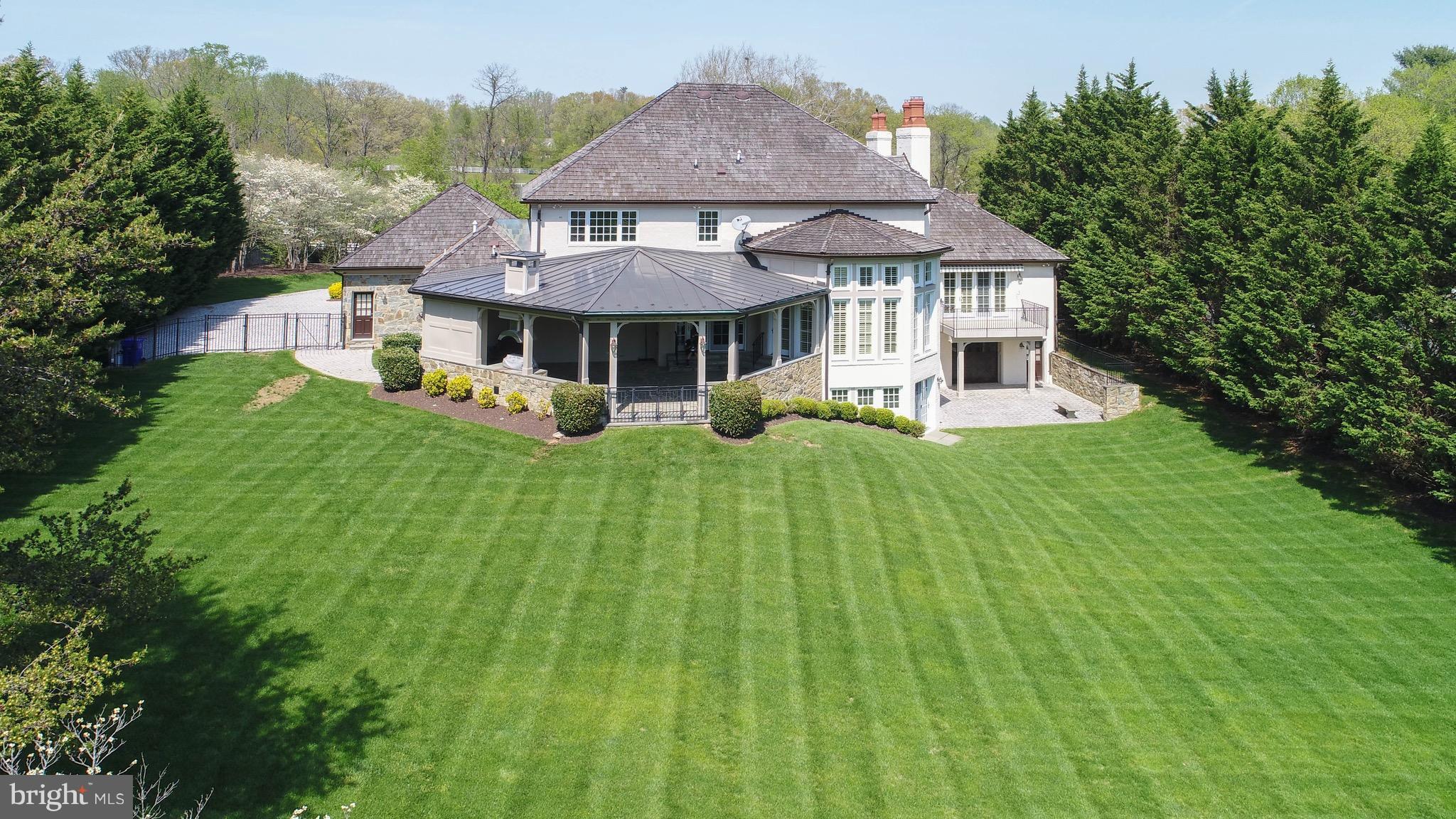 11400 Glen Road Potomac, MD 20854 - Photo 30 of 30 a front view of a house with garden